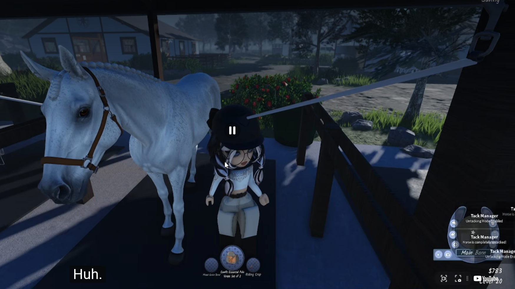 A braided white horse cross-tied in the barn aisle while the player uses the Tack Manager menu in Oak County Stables